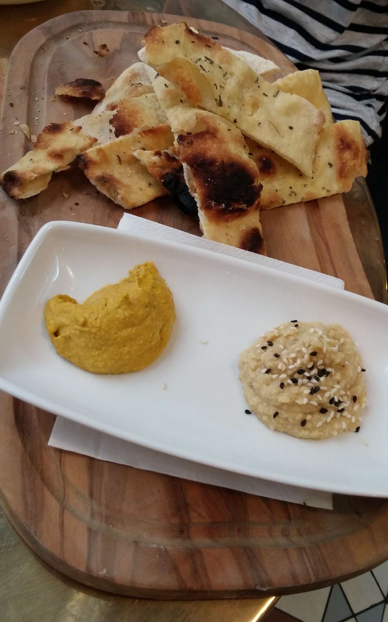 Flatbread + dips: L > R; carrot and toasted cumin, hummus