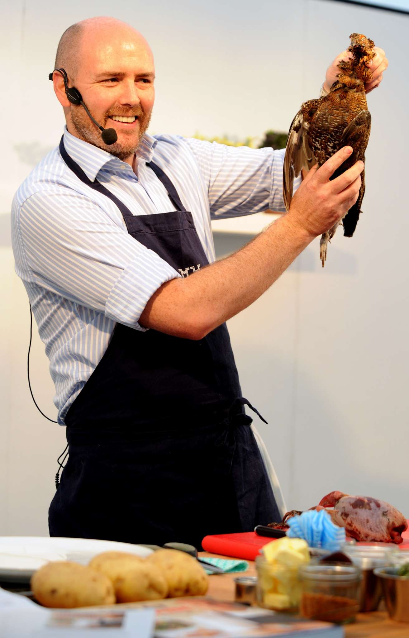 The annual Bolton Food and Drink festival drew in a large crowd this Sunday where revellers soaked up the atmosphere. Star attractions on the day were chefs John Torode of Masterchef fame and Aiden Byrne from the Manchester House restaurant. Chef Aiden Byrne gives a demo on how to cook Grouse. Picture by Paul Heyes, Sunday August 24, 2014.